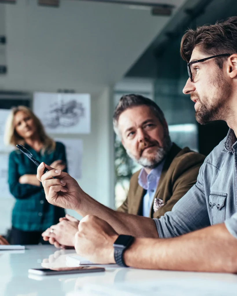 Man in meeting speaking